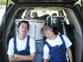 When the school bus failed to show up to transport PaliHi's marching band students and equipment to a competition in Granada Hills, parents with minivans came to the rescue. Danny Ward (left) and Jeremy Warfel helped load the van.